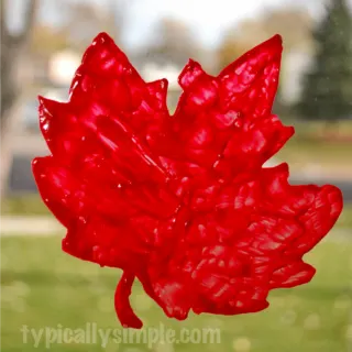 Using puffy paint and templates, create your own window clings!