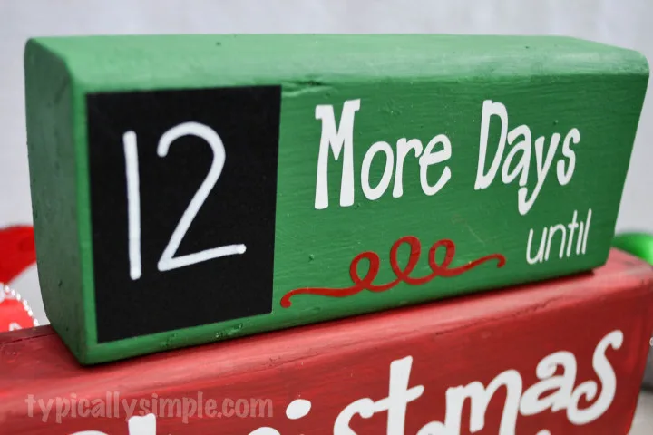 A great project to make with your Silhouette Cameo! Using wood blocks and vinyl, create this Christmas Countdown complete with a chalkboard for the numbers!