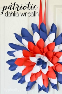 This red, white, and blue paper Dahlia wreath is a simple one-hour craft that is a fun decoration to hang in your home for Independence Day.