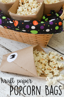 These easy DIY kraft paper bags are a fun way to serve popcorn at your Halloween parties! Just personalize the stickers to go with your party theme!