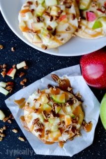 With a sugar cookie crust and cream cheese frosting, these apple caramel cookies are a scrumptious fall treat plus they are super simple to make!