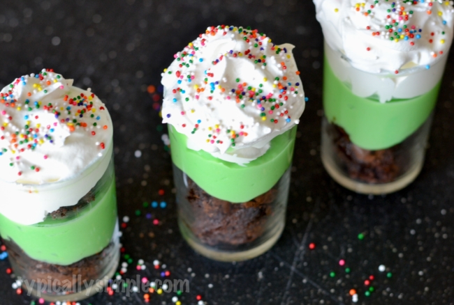 A festive treat perfect for St. Patrick's Day, these mint brownie dessert shooters are super easy to make and oh so yummy to eat!