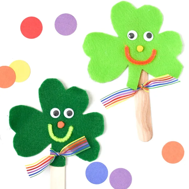 Using just a few basic craft supplies, make these cute craft stick shamrock puppets with the kids for St. Patrick's Day!