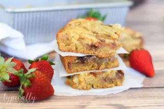 These strawberry swirl cheesecake blondie bars are a decadent treat that is quite easy to make. With some basic baking ingredients and a few minutes of prep they will quickly become your new go-to dessert to make for parties!