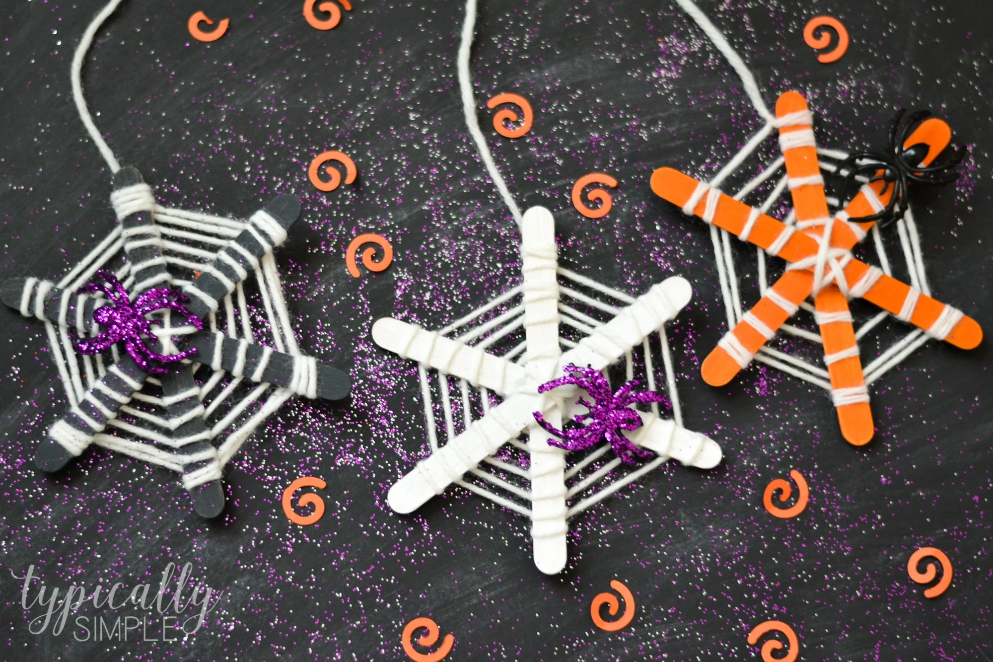 Make these super cute craft stick spiderwebs with the kids for Halloween! These make a great craft project for classroom parties or for a family fun night!