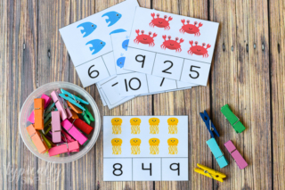 count and clip cards with a bowl full of colorful clothespins